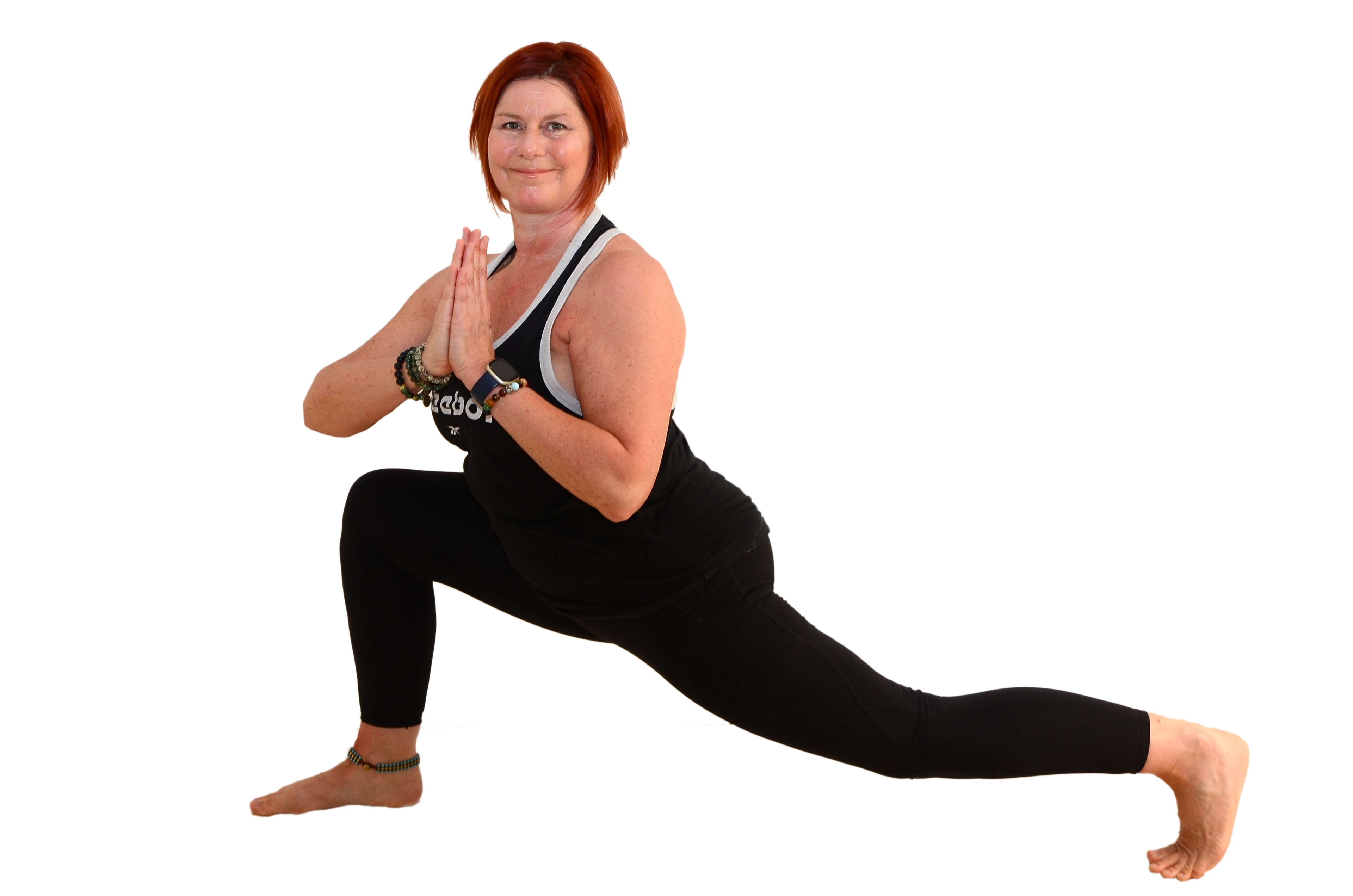 Rebecca in a yoga lunge pose