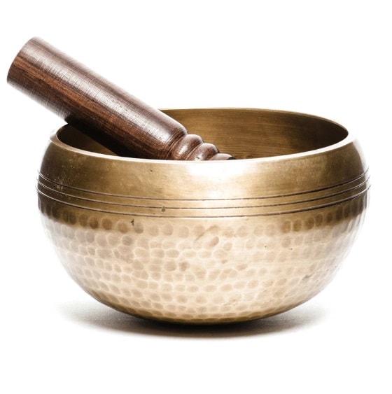 Brass singing bowl used in sound bath meditation